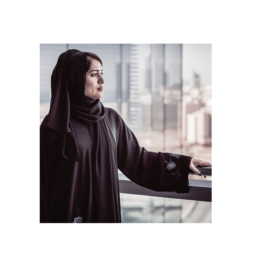 a woman standing at window